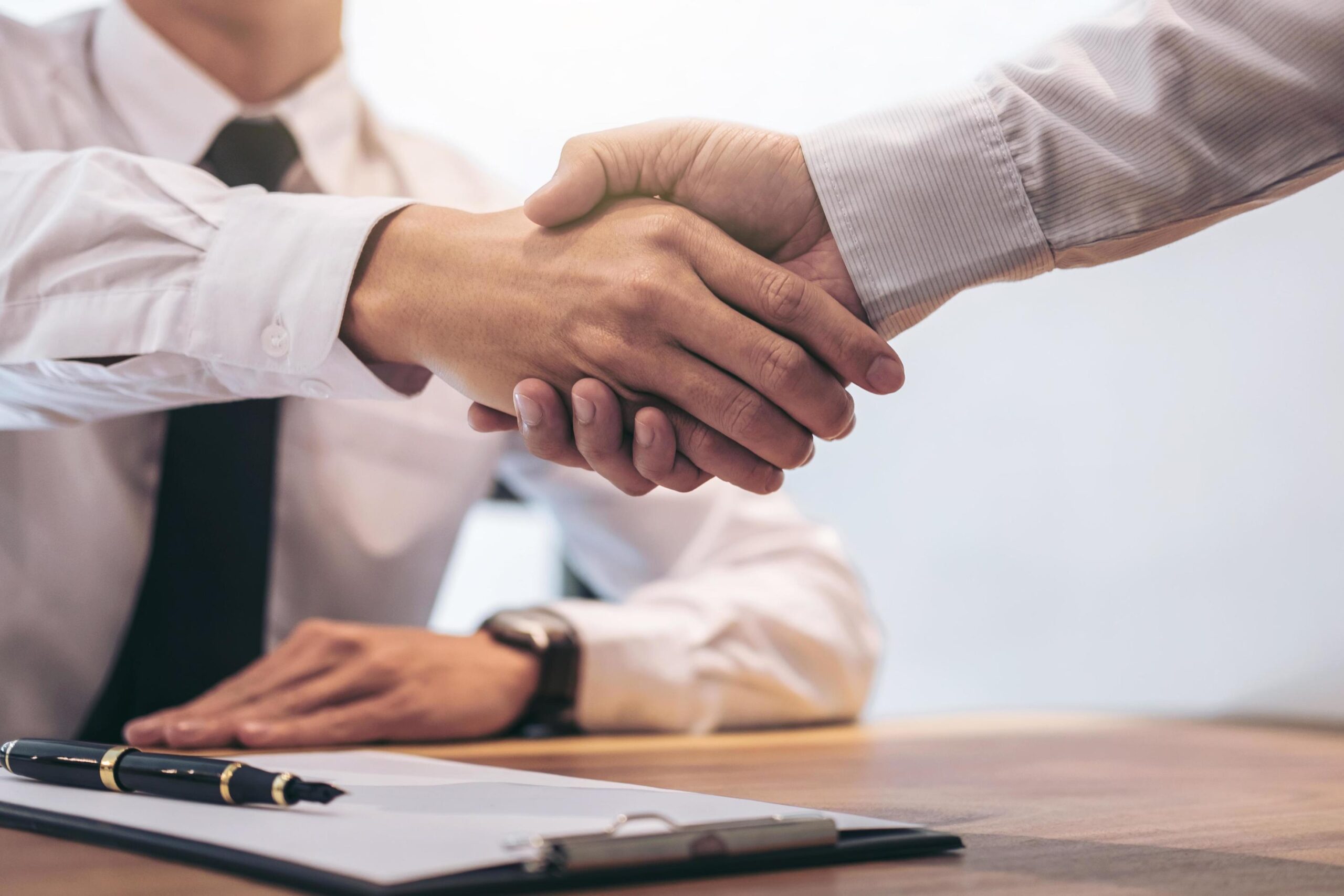 Business partnership — handshake